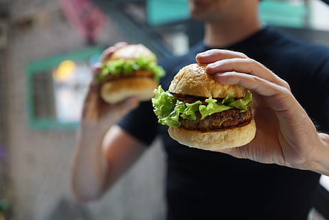 bread, food, sandwich, healthy, blur, bun, burger, close-up, crispy, delicious, dinner, eat, edible, fast, fast food, hamburger, hands, homemade, hungry, lettuce, lunch, meal, meat, nutrition, restaurant, snack, tasty, food and drink, holding, one person, unhealthy eating, hand, ready-to-eat, human hand, freshness, human body part, cheeseburger, focus on foreground, indulgence, take out food, temptation, 2K, CC0, public domain, royalty free