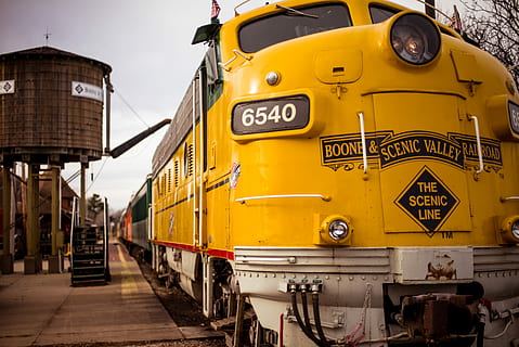 the santa express, photograph, yellow, boone, &, scenic, valley railroad train, train, platform, station, engine, mode of transportation, transportation, public transportation, land vehicle, day, text, rail transportation, city, no people, taxi, architecture, communication, street, stationary, car, travel, track, school bus, 5K, CC0, public domain, royalty free