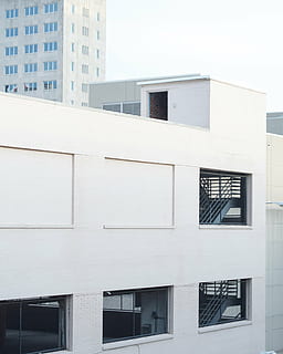 white concrete building, architecture, building, infrastructure, structure, establishment, parking lot, modern, building Exterior, built Structure, window, city, no people, residential district, day, outdoors, white color, low angle view, facade, glass - material, nature, office building exterior, sky, apartment, city life, concrete, 4K, CC0, public domain, royalty free