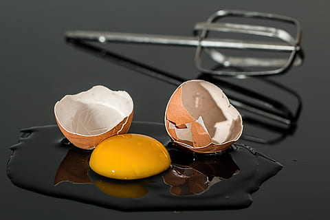 broken egg, egg, eggshell, broken, yolk, shell, yellow, egg beater, healthy, cracked, cholesterol, fragile, damaged, break, crack, smash, smashed, protein, food, ingredient, fresh, raw, nutrition, cooking, kitchen, cook, culinary, recipe, mess, preparation, albumen, food and drink, kitchen utensil, indoors, still life, sweet food, no people, freshness, reflection, spoon, eating utensil, dairy product, egg yolk, studio shot, household equipment, close-up, table, black background, 5K, CC0, public domain, royalty free