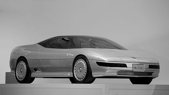 auto, prototype, auto-, macht, machine, motor, technologie, automotive, bouwkunde, mg, Brits, vervaardiging, high Tech, mg exe, motorvoertuig, wijze van transport, vervoer, sportwagen, landvoertuig, converteerbaar, glimmend, chroom, luxe, grijs, binnenshuis, metaal, modern, rijkdom, kopie ruimte, wiel, geen mensen, snelheid, zilverkleurig, profielweergave, persoonlijk landvoertuig, 5K, CC0, publiek domein, royaltyvrij