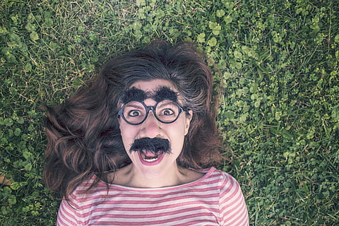 woman, fake, mustache, eyebrow, lying, green, grass, grimace, funny, expression, mask, happy, queer, people, portrait, person, emotion, fun, adult, man, human, hair, face, head, happiness, cheerful, girl, glasses, frames, brunette, eyebrows, moustache, headshot, front view, child, one person, childhood, looking at camera, humor, eyeglasses, young adult, plant, mouth, mouth open, day, hairstyle, making a face, 5K, CC0, public domain, royalty free