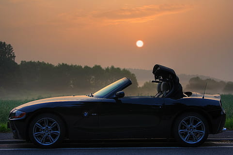 nero, convertibile, coupe, parcheggiata, strada, BMW, z4, e85, roadster, Alba, pkw, Aperto, lato, veicolo, auto, mezzi di trasporto, modo di trasporto, veicolo a motore, tramonto, cielo, veicolo terrestre, natura, guida, vista laterale, avventura, all'aperto, viaggio, una persona, luce del sole, terra, ruota, viaggio su strada, 2K, CC0, dominio pubblico, privo di copyright