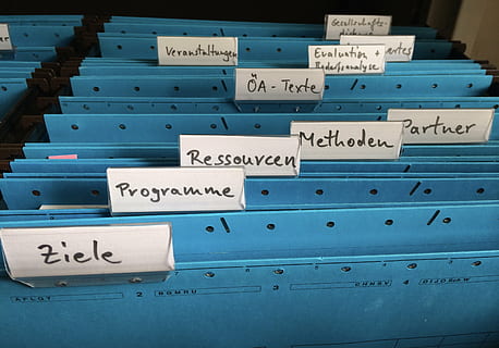 blue, metal folder cases, organization, register, folder, files, office, classify, file, archive, regulation, sort, work, text, indoors, western script, no people, close-up, communication, large group of objects, abundance, document, stack, paper, filing cabinet, still life, pattern, number, focus on foreground, in a row, order, business, message, 2K, CC0, public domain, royalty free