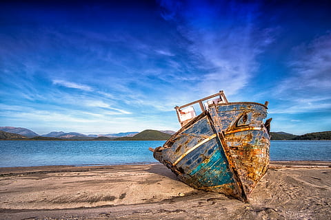 boat on shore, boat, sea, sky, landscape, nature, beach, sand, old, water, shipwreck, land, abandoned, nautical vessel, ship, decline, damaged, transportation, deterioration, cloud - sky, obsolete, mode of transportation, rusty, run-down, no people, outdoors, sinking, ruined, fishing industry, 5K