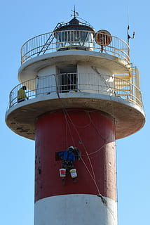 lighthouse, maintenance, craftsmen, construction work, built structure, architecture, sky, day, nautical vessel, building exterior, tower, nature, clear sky, mode of transportation, protection, transportation, low angle view, security, outdoors, safety, sunlight, travel, guidance, 4K, CC0, public domain, royalty free