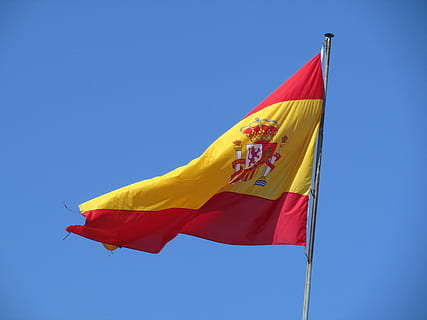 flag, spain, sky, wind, holiday, fluttering, spanish, patriotism, yellow, blue, environment, red, nature, clear sky, day, sunny, no people, multi colored, waving, pole, outdoors, low angle view, copy space, government, 4K, CC0, public domain, royalty free