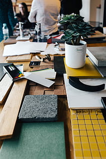 working, material samples, paper cutouts, Designers, material, samples, paper, fabric, design, concept, project, arrangement, composition, sample, cutout, idea, business, office, people, design Professional, indoors, desk, occupation, creativity, table, technology, computer, business Person, place of Work, laptop, women, men, businesswoman, adult, professional Occupation, teamwork, females, businessman, fashion, selective focus, furniture, incidental people, wireless technology, potted plant, plant, communication, wood - material, 4K