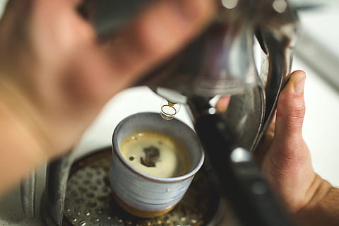 person holding coffeemaker, coffee, brew, beverage, brewed, brewing, hot, cappuccino, expresso, drink, cup, barrista, coffee shop, fresh, break, breakfast, morning, cafe, adult, one person, human body part, close-up, indoors, holding, women, food and drink, headshot, hand, coffee - drink, human hand, selective focus, mug, portrait, drinking, hairstyle, luxury, 5K, CC0, public domain, royalty free
