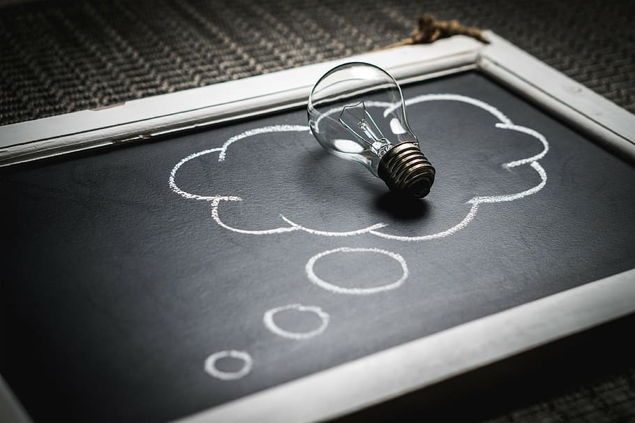 clear, light bulb, black, chalk board, thought, idea, innovation, imagination, inspiration, lightbulb, solution, brainstorm, brain storm, invention, think, chalkboard, blackboard, school, education, learning, studying, analysis, problem, concept, symbol, creativity, lamp, bubble, philosophy, meditation, mental image, vision, business, visionary, psychology, no people, close-up, indoors, day, high angle view, music, still life, selective focus, focus on foreground, arts culture and entertainment, headphones, communication, art and craft, black color, listening, white color, connection, shape, vignette, 4K