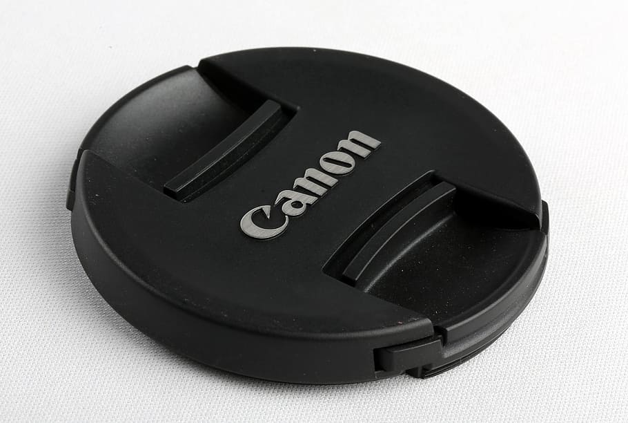 krytka objektivu, příslušenství fotoaparátu, kameru, víčko, objektiv, doplněk, plastický, ochrana, Černá, fotografování, kruh, profesionální, fotografický, sdělení, Černá barva, technologie, text, uvnitř, studio shot, detail, bílé pozadí, spojení, bezpečnost, nikdo, podepsat, západní skript, jeden objekt, osobní příslušenství, geometrický tvar, vystříhnout, označení, 5K