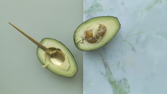 two, sliced, avocados, close-up photo, avocado, spoon, fruit, vegetable, healthy, food and drink, healthy eating, food, freshness, wellbeing, indoors, green color, cross section, directly above, eating utensil, no people, table, slice, high angle view, still life, halved, seed, ripe, temptation, 4K, CC0, public domain, royalty free