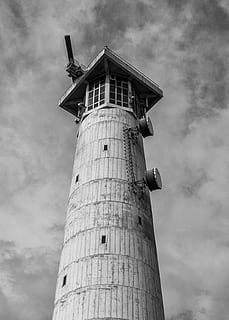 tower, lighthouse, architecture, sky, building, travel, landmark, low angle view, built structure, cloud - sky, building exterior, tall - high, nature, day, no people, guidance, travel destinations, outdoors, security, protection, direction, environmental conservation, 2K, CC0, public domain, royalty free
