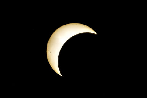 eclipse, solar, sun, solar eclipse, no people, black background, copy space, night, studio shot, lighting equipment, yellow, dark, indoors, illuminated, single object, moon, close-up, astronomy, fruit, banana, electricity, space, light bulb, electric lamp, 2K, CC0, public domain, royalty free