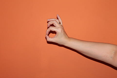 Finger, Gesture, Hands, Ok, Alright, Gut, human body part, human hand, studio shot, human arm, adult, colored background, hand, one person, body part, indoors, close-up, holding, women, limb, healthcare and medicine, orange color, human limb, nail, touching, orange background, 4K, CC0, public domain, royalty free