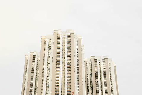 low, angle photo, beige, high-rise, building, cloudy, sky, daytime, far, photo, high, rise, buildings, architecture, structure, skyscraper, development, city, apartment, modern, cityscape, discovery, city life, urban skyline, building exterior, built structure, office building exterior, tall - high, residential district, no people, tower, construction industry, copy space, industry, 5K, CC0, public domain, royalty free