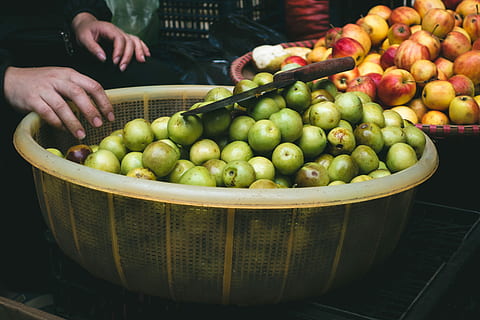 apples, market, Small, apple, fruit, hands, outside, food, freshness, healthy Eating, basket, apple - Fruit, food And Drink, organic, green color, wellbeing, container, one person, large group of objects, real people, abundance, for sale, market stall, midsection, small business, day, outdoors, street market, 5K
