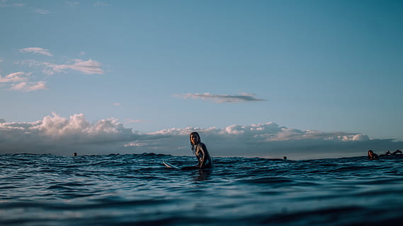 person, sitting, surfboard, surrounded, blue, ocean, daytime, body, water, Corona, ad, cloud, surfing, surf, sea, people, nature, sport, outdoors, men, summer, waterfront, sky, real people, one person, scenics - nature, leisure activity, beauty in nature, cloud - sky, adventure, trip, horizon, day, horizon over water, 4K, CC0, public domain, royalty free