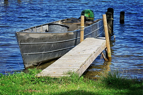 boot, individually, dock, boardwalk, jetty, rest, anchorage, water, nature, nautical vessel, transportation, grass, no people, lake, day, mode of transportation, wood - material, outdoors, moored, tranquility, plant, abandoned, high angle view, obsolete, land, wooden post, rowboat, 4K, CC0, public domain, royalty free