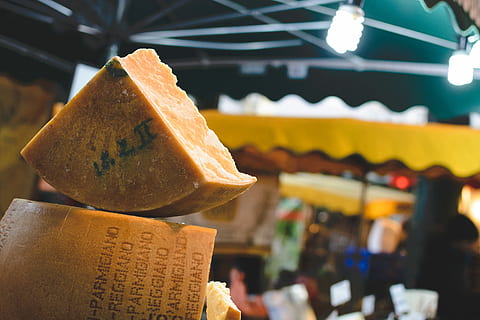 Piece, Gouda cheese, cheese, yellow, food, market, store, cultures, retail, focus on foreground, food and drink, day, freshness, close-up, incidental people, dairy product, indoors, ready-to-eat, stack, bread, for sale, sweet food, architecture, snack, 5K, CC0, public domain, royalty free