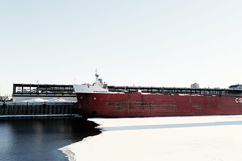 concrete, building, body, water, red, white, ship, daytime, container, carrier, cargo, ice, winter, transportation, freight transportation, cargo container, shipping, nautical vessel, outdoors, day, harbor, industry, clear sky, sky, copy space, architecture, nature, no people, built structure, pier, waterfront, 5K, CC0, public domain, royalty free