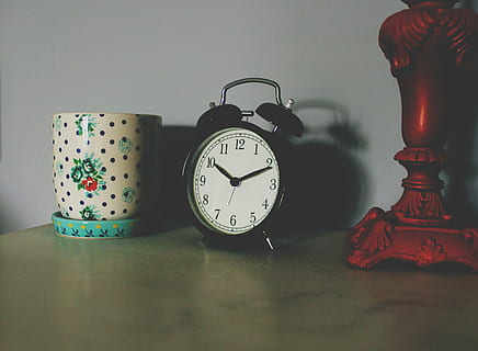 twin, bell alarm clock, displaying, 10:11, black, alarm, clock, white, vase, brown, lamp, base, still, items, things, desk, table, bedside, decor, mug, shadow, bokeh, alarm clock, time, old-fashioned, indoors, no people, clock face, close-up, day, still life, wall - building feature, number, pattern, antique, studio shot, accuracy, group of objects, home interior, retro styled, floral pattern, minute hand, 4K, CC0, public domain, royalty free