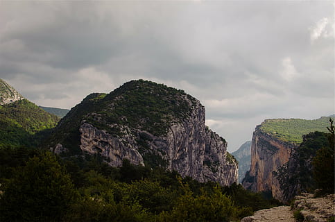 mountain terrain, white, cloudy, skies, aerial, photography, green, brown, hills, mountains, cliffs, rocks, rock - object, cloud - sky, landscape, nature, no people, scenics, outdoors, day, travel destinations, mountain, sky, scenics - nature, rock, beauty in nature, tranquil scene, tranquility, solid, tree, non-urban scene, plant, rock formation, land, environment, cliff, mountain range, formation, eroded, 1080P