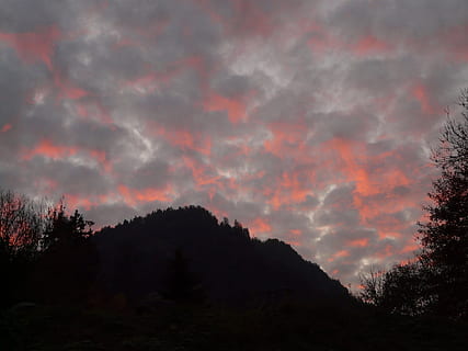 sunset, sky, clouds, fire, fiery, red, reddish, burning, gloomy, threatening, evening, afterglow, tree, beauty in nature, cloud - sky, plant, scenics - nature, tranquil scene, tranquility, silhouette, no people, forest, nature, mountain, non-urban scene, idyllic, land, outdoors, growth, landscape, woodland, pine tree, coniferous tree, 2K, CC0, public domain, royalty free