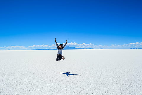 cold, cool, ice, jump, person, shadow, sky, winter, human arm, arms raised, land, blue, one person, nature, limb, mid-air, leisure activity, day, full length, landscape, scenics - nature, clear sky, sunlight, beauty in nature, environment, vacations, body part, human limb, freedom, salt flat, 4K, CC0, public domain, royalty free