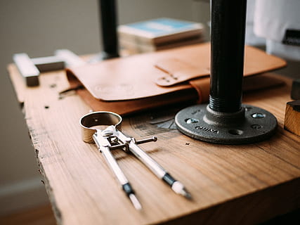 compass, drafting, tools, design, notebook, wood, table, indoors, wood - material, no people, selective focus, close-up, flooring, furniture, still life, musical instrument, high angle view, music, arrangement, equipment, technology, hardwood floor, preparation, desk, office, 1080P, CC0, public domain, royalty free
