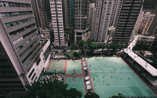 joc de hong kong, aèria, veure la fotografia, camp de futbol, envoltar, edificis, edifici, torre, gratacels, arquitectura, ciutat, exterior de l'edifici, estructura construïda, vista d’angle alt, arbre, dia, planta, carrer, cap gent, naturalesa, a l'aire lliure, transport, vehicle terrestre, manera de transport, cotxe, barri residencial, paisatge urbà, 4K, CC0, domini públic, lliure de regalies