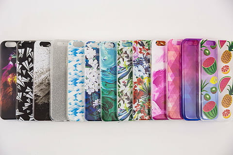 assorted-color-and-print iphone case lot, mobile, phone, case, design, style, accessories, gadget, technology, multi colored, variation, choice, no people, in a row, studio shot, indoors, clothing, fashion, side by side, pattern, group of objects, order, hanging, white background, large group of objects, textile, close-up, arrangement, retail, floral pattern, menswear, 4K, CC0, public domain, royalty free