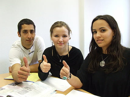 two, women, one, man, sitting, beside, table, language school, team, interns, people, indoors, females, adult, meeting, young Adult, smiling, teamwork, business, togetherness, group of people, portrait, desk, young women, learning, men, communication, furniture, front view, office, studying, explaining, 2K, CC0, public domain, royalty free