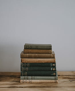 pile, bible, brown, surface, stack of books, book, table, stack, hardback, hard cover, vintage, old, classic, closeup, binding, cover, blank space, indoors, studio shot, no people, copy space, wood - material, gray, close-up, gray background, wood, business, balance, still life, abundance, group of objects, flooring, single object, 5K, CC0, public domain, royalty free