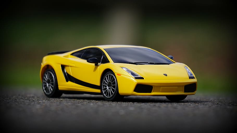 cotxe, ràpid, lamborghini, model, carretera, velocitat, cotxe esportiu, roda, groc, taxi, taxi groc, cotxe de joguina, joguina, transport, infància, manera de transport, automòbil, cap gent, enfocament selectiu, sol objecte, vehicle terrestre, viatjar, diversió, carrer, moviment, nivell superficial, vehicle terrestre personal, luxe, 5K