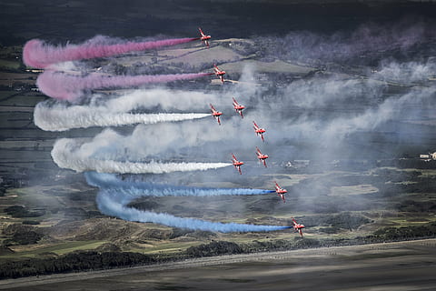 airshow at daytime, red, arrows, raf, jet, plane, air, show, newcastle, 2014, august, fighter, airplane, aircraft, atmospheric, formation, outdoors, day, water, no people, nature, air vehicle, transportation, flying, smoke - physical structure, vapor trail, airshow, mode of transportation, teamwork, cooperation, motion, speed, on the move, sport, multi colored, aerobatics, people, military airplane, aerospace industry, 5K, CC0, public domain, royalty free