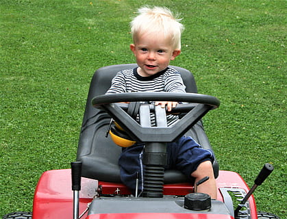 summer, grass, machine, mowing, children, childhood, real people, child, sitting, portrait, looking at camera, one person, full length, front view, males, casual clothing, blond hair, day, leisure activity, cute, boys, baby, men, hair, innocence, outdoors, 2K, CC0, public domain, royalty free