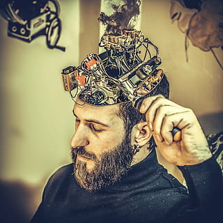 shallow, focus photography, man, holding, black, metal device, mechanical, brain, machine, manipulation, beard, one man only, adult, only men, human face, human head, adults only, men, males, headshot, facial hair, one person, portrait, close-up, royalty, indoors, crown, handsome, lifestyles, beautiful people, real people, front view, attitude, hairstyle, 2K, CC0, public domain, royalty free