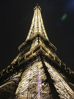 low-angle photo, lit, eiffel tower, paris, eiffel, tower, night, light, french, france, architecture, famous, paris france, paris skyline, attraction, low angle view, built structure, building exterior, building, travel destinations, no people, illuminated, religion, tall - high, place of worship, sky, history, tourism, belief, the past, nature, spirituality, outdoors, 4K, CC0, public domain, royalty free