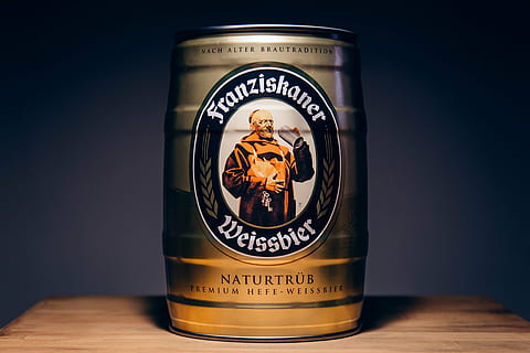 unopened, gray, franziskaner weissbier naturtrub, franzishaner, weissbier, can, brown, wooden, surface, keg, beer, brew, alcohol, drink, studio shot, colored background, black background, no people, large group of objects, close-up, shadow, indoors, day, text, communication, western script, table, still life, food and drink, container, representation, single object, refreshment, wood - material, animal representation, 4K, CC0, public domain, royalty free