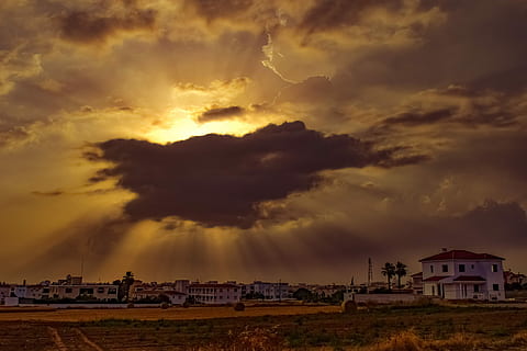 clouds, covering, sunlight, city, sunset, sky, landscape, sunbeam, afternoon, town, paralimni, cyprus, cloud - sky, architecture, built structure, building exterior, building, nature, house, residential district, storm, no people, beauty in nature, dramatic sky, land, outdoors, environment, storm cloud, ominous, power in nature, townscape, 5K, CC0, public domain, royalty free