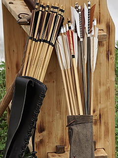 brown, arrows, leather quivers, quiver, archery, arrow bow, objectives, shoot, traditionally, historically, middle ages, wood - material, indoors, no people, work tool, workshop, still life, high angle view, large group of objects, tool, equipment, hanging, hand tool, art and craft, business, occupation, directly above, carpenter, table, close-up, hand saw, 5K, CC0, public domain, royalty free