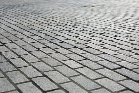 closeup, photography, concrete, pavement, gray, sidewalk, path, cobblestone, city, urban, pattern, backgrounds, textured, full frame, no people, day, outdoors, close-up, selective focus, footpath, repetition, high angle view, design, shape, street, focus on foreground, in a row, metal, geometric shape, paving stone, tiled floor, 5K