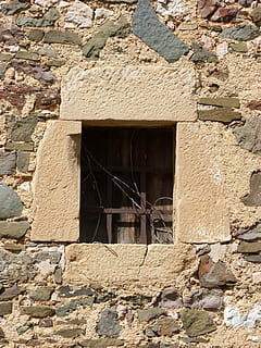 window, bars, old, architecture, wall stone, built structure, building exterior, building, no people, day, wall - building feature, wall, abandoned, stone wall, outdoors, house, low angle view, solid, sunlight, weathered, nature, damaged, 4K, CC0, public domain, royalty free