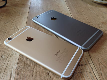 two, gold, space, gray, iphone 6', brown, wood, apple, iphone, ios, table, still life, wood - material, high angle view, indoors, communication, no people, wireless technology, pen, publication, book, paper, education, technology, connection, close-up, text, note pad, laptop, blank, 2K, CC0, public domain, royalty free