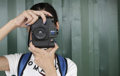 person, woman, camera, girl, blur, casual, close-up, female, focus, lady, wear, camera - photographic equipment, technology, photography themes, one person, holding, activity, front view, photographing, occupation, portrait, headshot, looking through an object, adult, indoors, photographic equipment, casual clothing, unrecognizable person, digital camera, obscured face, photographer, filming, slr camera, teenager, 4K, CC0, public domain, royalty free