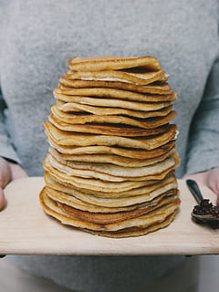 pancakes, brown, tray, person carrying pancakes, plate, pancake, stack, pile, breakfast, brunch, food, human Hand, people, food And Drink, human body part, one person, holding, hand, real people, unrecognizable person, freshness, lifestyles, indoors, unhealthy eating, bread, focus on foreground, body part, table, sweet food, finger, snack, preparing food, temptation, 4K, CC0, public domain, royalty free