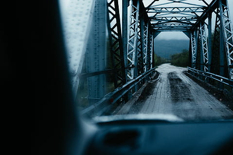 gray concrete bridge, macro photography, bridge, windscreen, structure, road, perspective, architecture, vehicle, car, travel, transport, moody, looking out, transportation, connection, mode of transportation, built structure, bridge - man made structure, vehicle interior, motor vehicle, nature, winter, cold temperature, land vehicle, windshield, no people, snow, metal, day, outdoors, 5K, CC0, public domain, royalty free