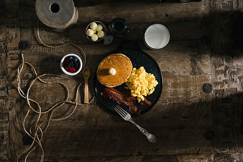 real american breakfast, Real american, american breakfast, american, bacon, berries, breakfast, butter, egg, eggs, pancake, pancakes, food, wood - Material, table, rustic, homemade, directly above, indoors, high angle view, food and drink, no people, freshness, kitchen utensil, ready-to-eat, healthy eating, eating utensil, bowl, fruit, wellbeing, vegetable, still life, spoon, temptation, table knife, snack, 5K, CC0, public domain, royalty free