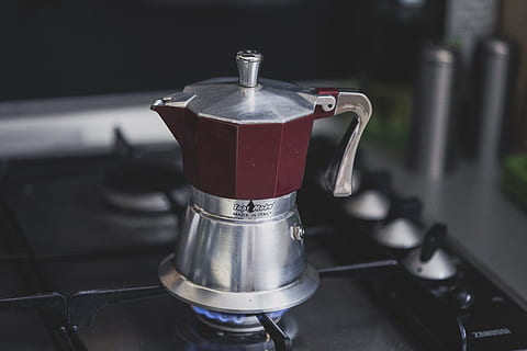 brewing, coffee, espresso, gas stove, hot, kitchen, moka, percolator, stove, heat - Temperature, coffee - Drink, cafe, drink, coffee Maker, cup, appliance, food and drink, domestic room, domestic kitchen, espresso maker, indoors, no people, close-up, preparation, home, coffee pot, focus on foreground, household equipment, red, silver colored, steel, 5K, CC0, public domain, royalty free